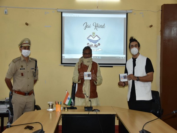 Uttarakhand Chief Minister Trivendra Singh Rawat (centre), released a song 'Jazba' celebrating the spirit of Police during corona crisis. Photo/ANI