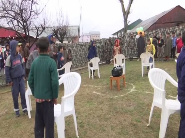 Children playing musical chair at Army's public outreach in Baramulla
