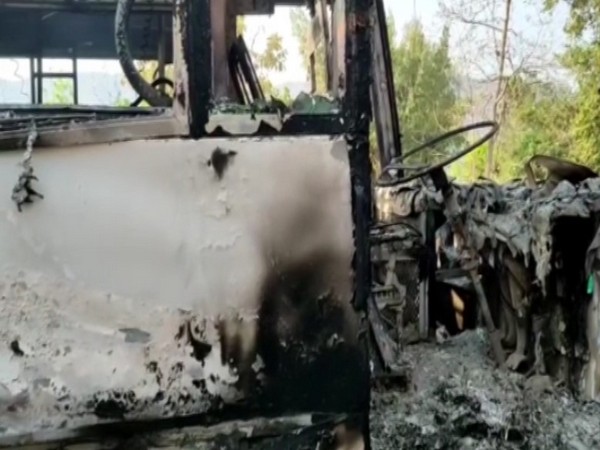 A visual of the bus set ablaze by Maoists in Alluri Sitha Ramaraju (Photo/ANI)