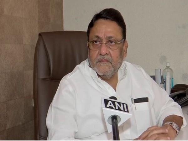 Maharashtra Cabinet Minister Nawab Malik speaking to ANI on Sunday. Photo/ANI