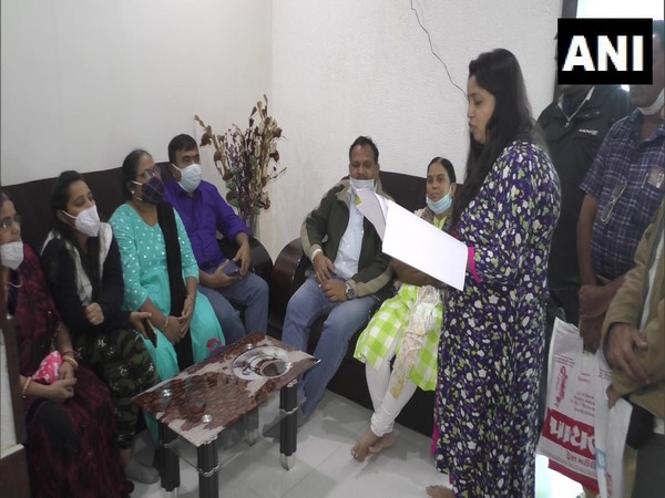 Beneficiaries of PMAY (U) in Surat at Lok Sabha MP CR Patil's office. (Photo/ANI)