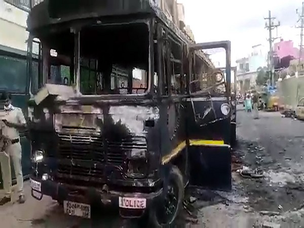 Visual of vehicles burnt by angry mob as the violence broke out over an alleged inciting social media post, at DJ Halli police station, in Bengaluru. (Photo/ANI)