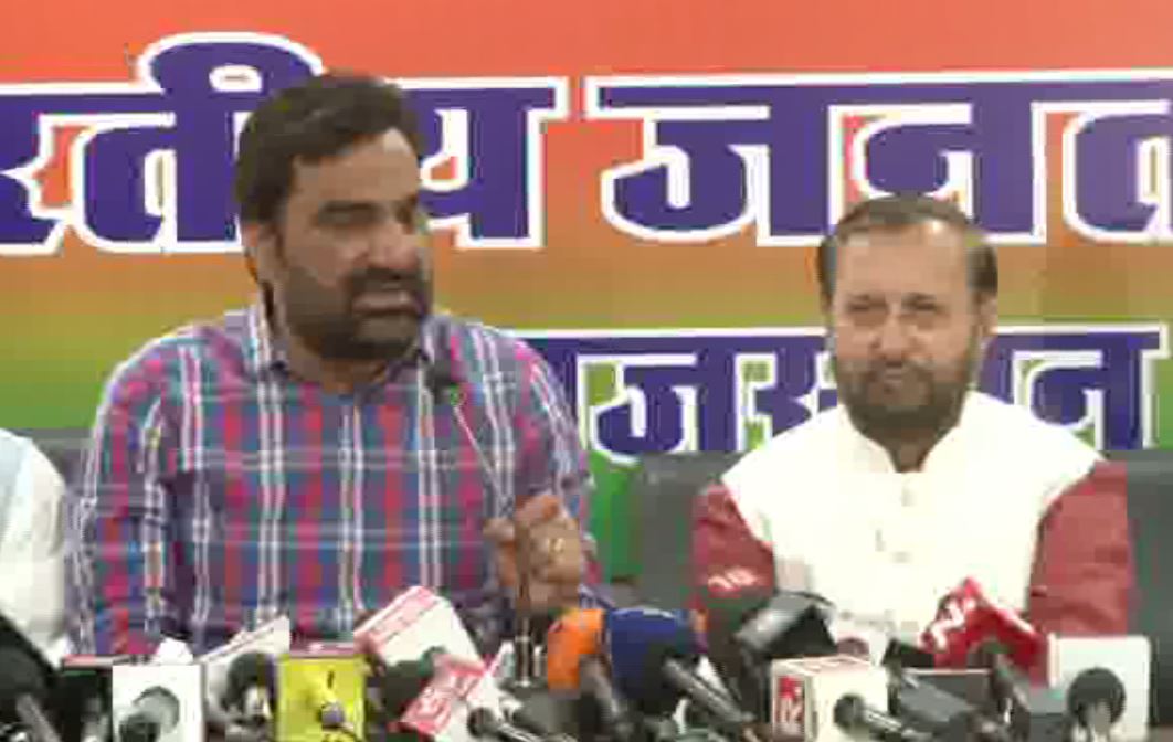 RLP president Hanuman Beniwal with Union Minister Prakash Javadekar at BJP office in Jaipur on Thursday during a press conference. Photo/ANI