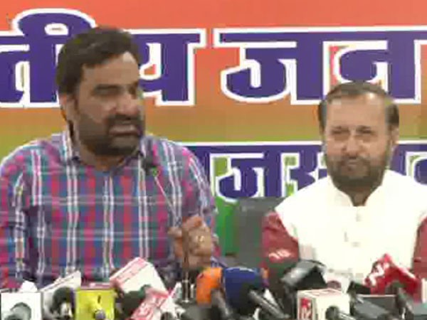 RLP president Hanuman Beniwal with Union Minister Prakash Javadekar (File Photo) Photo/ANI