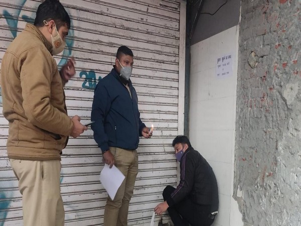 A wine shop was sealed in Delhi's Malviya Nagar for flouting COVID norms (Photo/ANI)