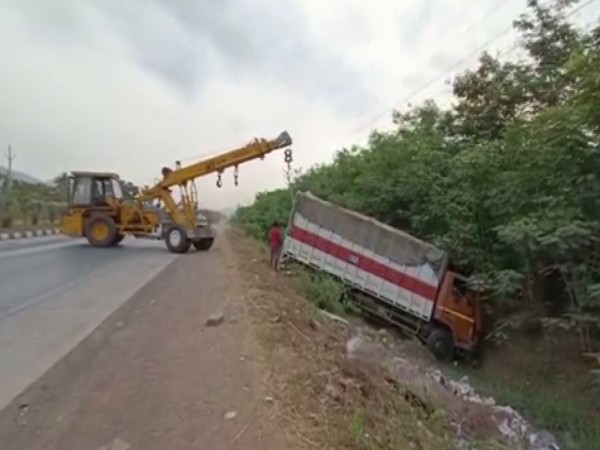 The truck carrying cannabis being confiscated on NH-16 (Photo/ANI)