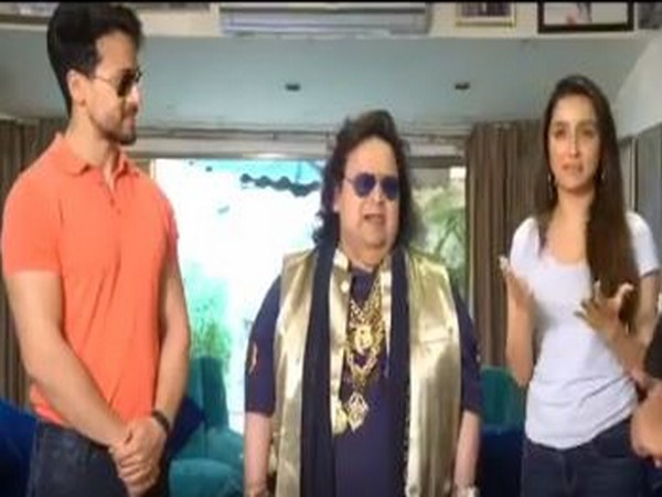 Actor Tiger Shroff, musician Bappi Lahiri and actor Shraddha Kapoor (Photo/Twitter)