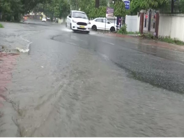 Vehicles ply on waterlogged roads in Bhopal