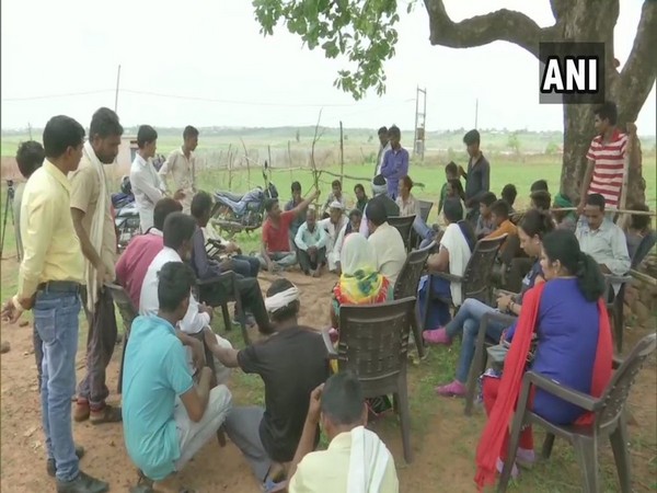 The district authorities while holding a meeting with villagers in Sarotipura village in Bhopal on Thursday. Photo/ANI