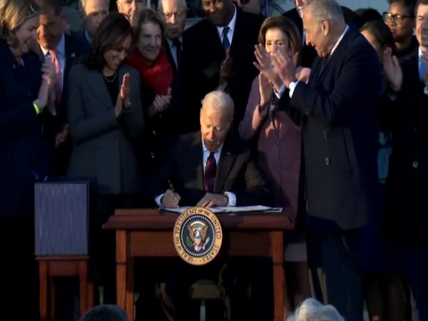 US President Joe Biden signing the infrastructure bill at the White House
