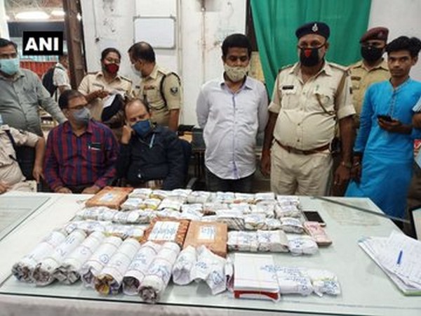 The recovered cash and gold at the Patna Junction railway station. 