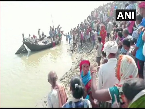 Around 100 people were on board when the boat capsized in the river Ganga. (Photo/ANI)
