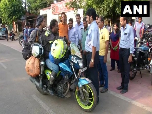 Rathindra Das with wife Gitanjali  is on a motorcycle tour across the country to create awareness among people to save tiger.[Photo/ANI] 