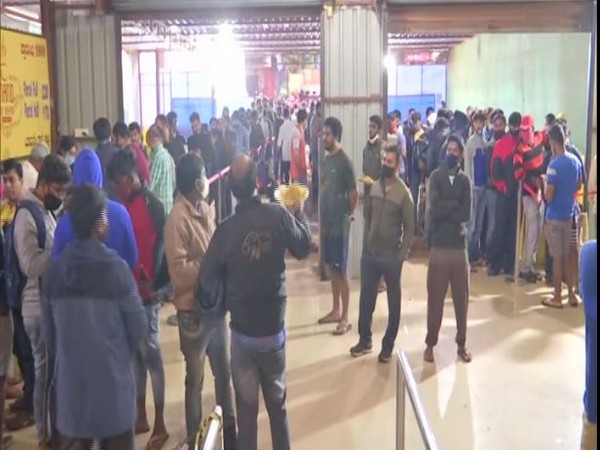 Despite social distancing advisories, biryani lovers throng to Bengaluru eatery. (Photo/ANI)