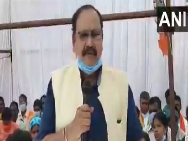 BJP MP Mohan Mandavi speaking at a public gathering in Chhattisgarh. 