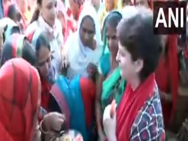 Priyanka Gandhi interacts with women farmers on farm at Barabanki.