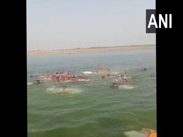 Boat carrying over 40 people to a temple capsized in Chambal river in Rajasthan's Kota on Wednesday. Photo/ANI