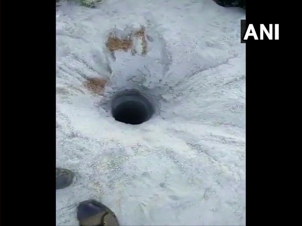 The open borewell in which a three-year-old child fell into it in Medak town, Andhra Pradesh on Wednesday.