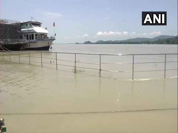 Water level of Brahmaputra river continues to rise in Guwahati, following heavy rainfall. [Photo/ANI]