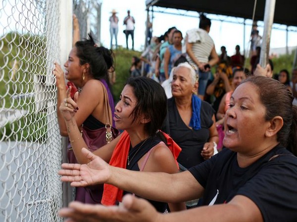 Policemen seen outside Raul Brasil elementary school in Suzano after shooting on Wednesday