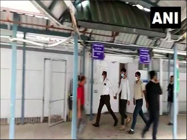 Mohsin Ahmad with NIA officials (Photo/ANI)