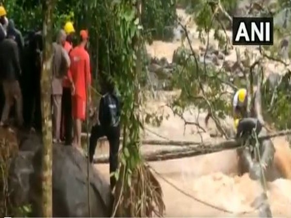 NDRF personnel and local volunteers made a temporary bridge to rescue stranded people in Meppadi, Wayanad.