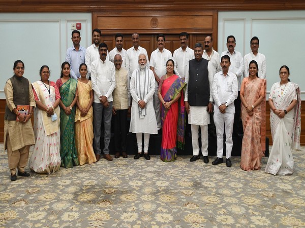 Prime Minister Narendra Modi with members of the district panchayat from Gujarat (Photo credit: PM Narendra Modi Twitter)