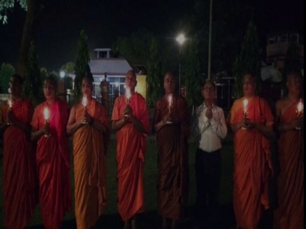 Buddhist monk took out a candlelight march for the victims of serial bombing in Sri Lanka at Bodh Gaya on Sunday 