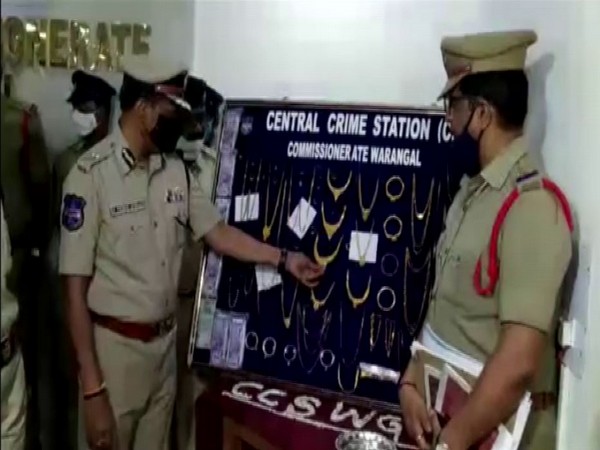 Police officials showing gold ornaments recovered from the possession of House Burglar. (Photo/ANI)