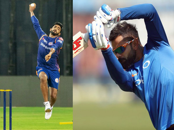 India captain Virat Kohli (on the right) and Indian bowler Jasprit Bumrah (on the left)