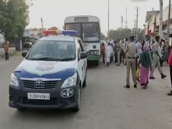 Bus services operated with police escort in Gadwal city [Photo/ANI]