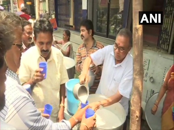 Social worker Satyanarayana has been distributing buttermilk to passers-by in Vijaywada