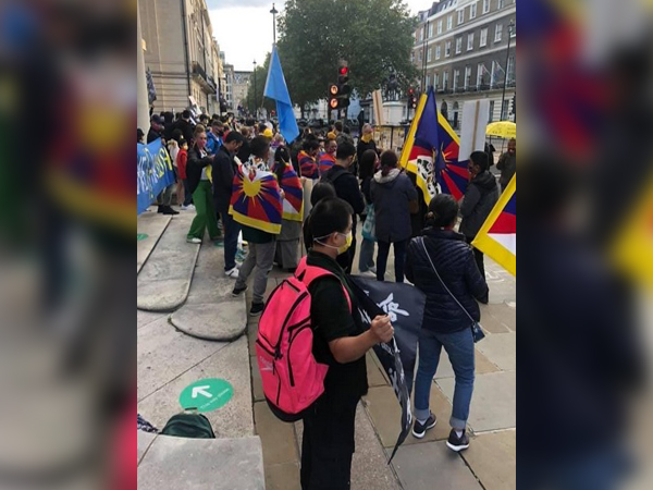 Some of the banners read: 'Free Hong Kong', 'Free Tibet' and 'China Closed the Uyghur Camps'