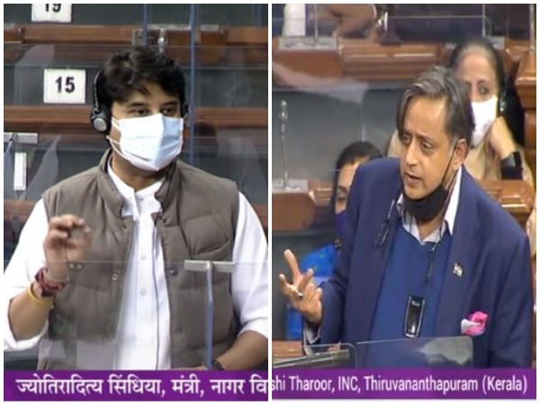 Union Minister Jyotiraditya Scindia and Congress MP Shashi Tharoor in Lok Sabha