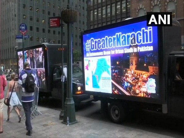 Trucks carrying digital ads, highlighting the atrocities against minorities in Karachi, seen in New York