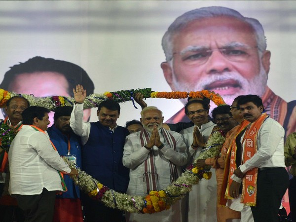 A picture of Prime Minister Narendra Modi along with Chief Minister Devendra Fadnavis and Shiv Sena chief Uddhav Thackeray during poll campaigning in Maharashtra. Photo/ANI (File photo)