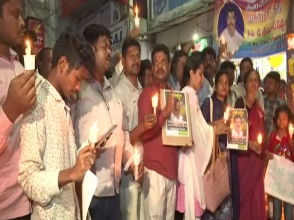 RTC employees carry out a candlelight march from Musheerabad depot to Ram Nagar Circle in Hyderabad on Sunday. Photo/ANI