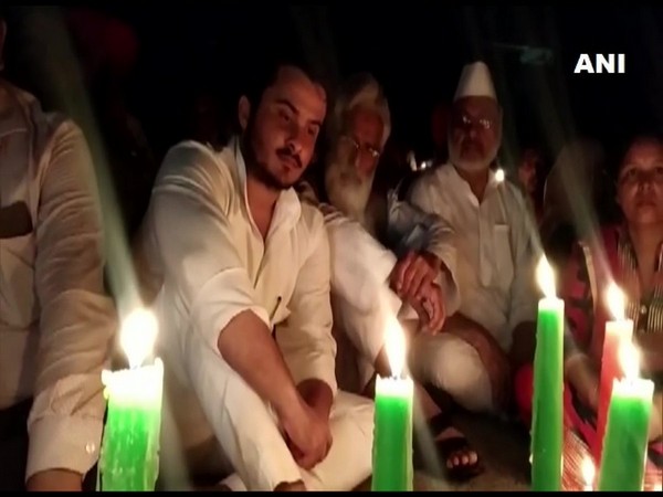 A visual from the candlelight protest held by Samajwadi Party MLA Abdullah Azam Khan on Wednesday. (Photo/ANI)