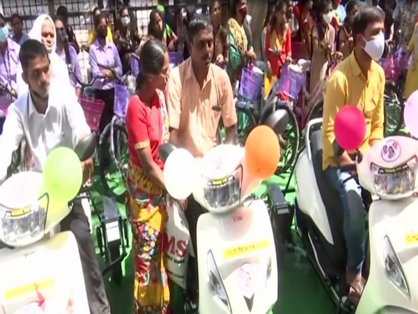 Bicycles to girls and motor vehicles to the specially-abled were distributed on MLC K Kavitha's birthday on Saturday. [Photo/ANI]