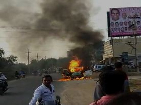 A moving car caught fire in Ranga Reddy, Telangana. Photo/ANI