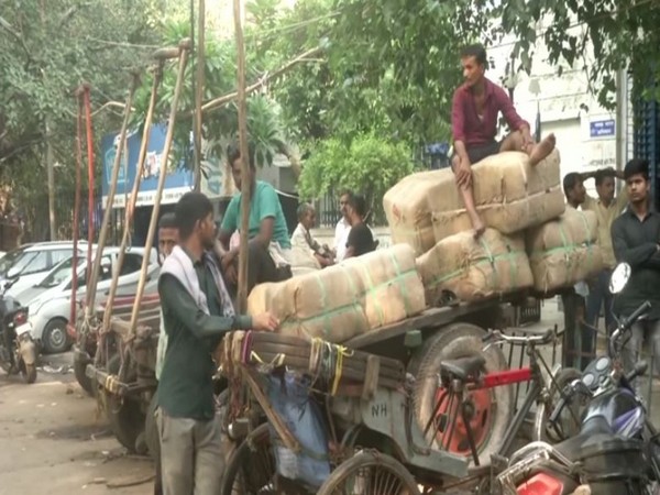 Cart pullers at Chandni chowk area. (Photo/ ANI)