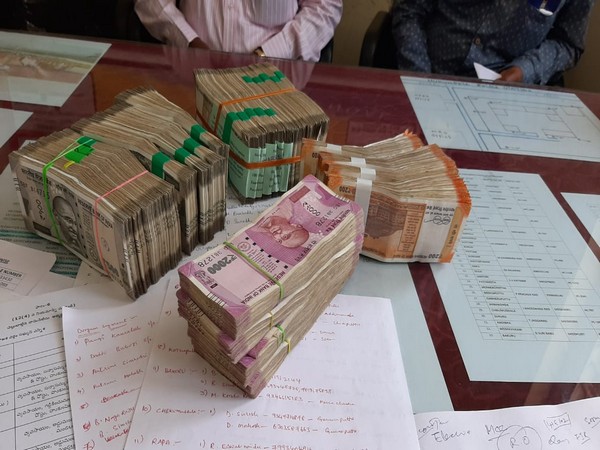 Rs 18.3 lakh in cash was recovered from a vehicle in Visakhapatnam in Andhra Pradesh on Friday. Photo/ANI