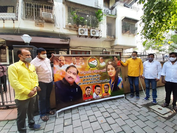 Nationalist Congress Party on Friday put up a poster outside Eknath Khadse's residence. (Photo/ANI)