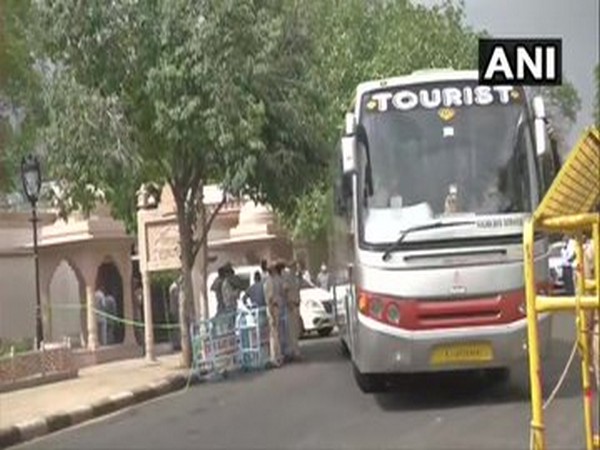 Buses, carrying MLAs, leave from the residence of Chief Minister Ashok Gehlot after the Congress Legislative Party (CLP) meeting concluded on Monday.