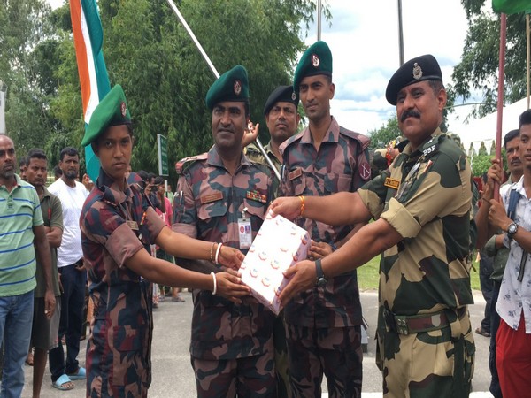 BSF, Border Guards Bangladesh exchange sweets at Fulbari Border.