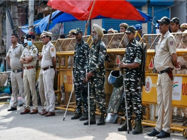 Security personnel stand guard at Jahangirpuri on April 22 (File Photo/ANI)