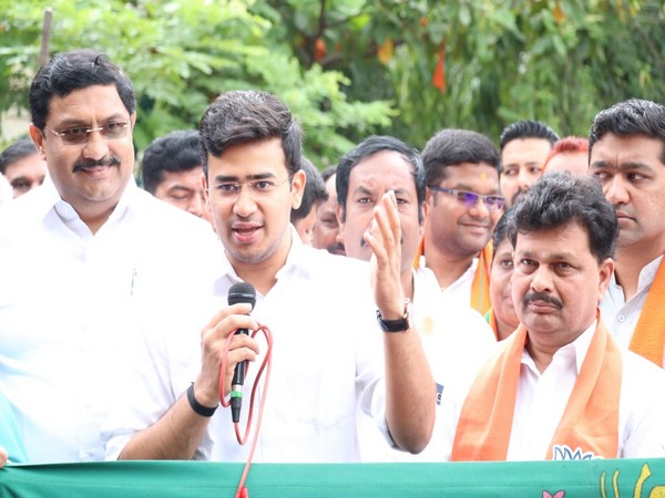 BJP MP Tejasvi Surya address a gathering in Vijaynagar on Monday. Photo/ANI