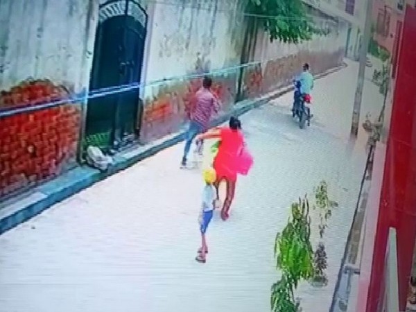 A CCTV footage where a woman is seen running behind the assailants who snatched her chain