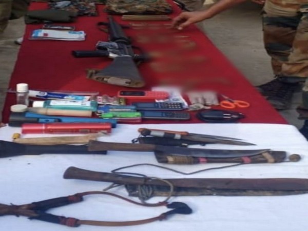 A large quantity of war-like stores was recovered from slain insurgent including an assault rifle. Photo/ANI