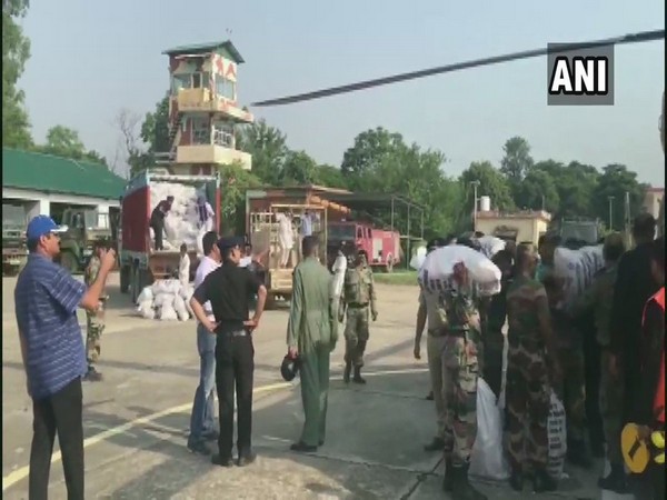 Armed forces provides food and water to flood- affected people